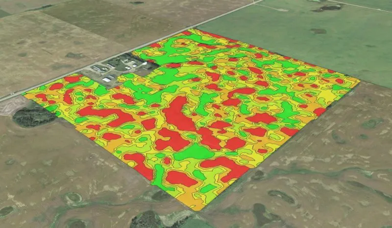 A field rendered as productivity zones in red, yellow and green over satellite imagery